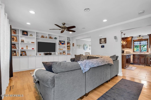 27 Barkalow Ave, Freehold, NJ 07728 - living room featuring crown molding, a ceiling fan, light wood-style flooring, and recessed lighting