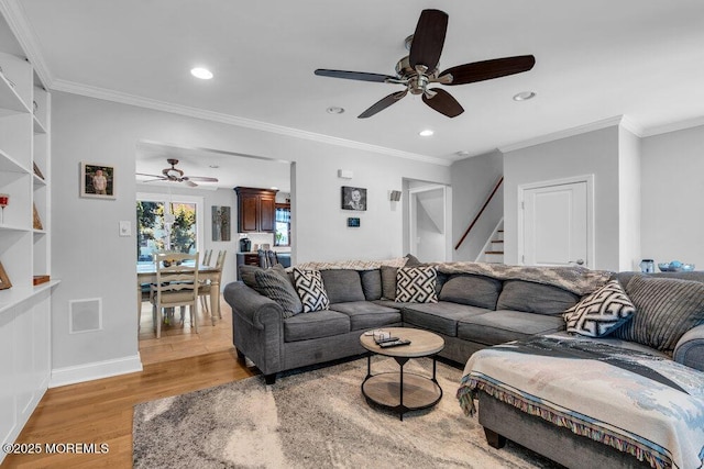 27 Barkalow Ave, Freehold, NJ 07728 - living room with ceiling fan, light wood-style floors, stairway, crown molding, and recessed lighting