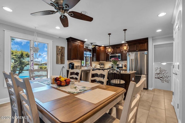 27 Barkalow Ave, Freehold, NJ 07728 - dining space featuring ceiling fan, crown molding, recessed lighting, a chandelier, and light tile patterned floors