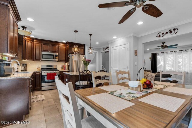 27 Barkalow Ave, Freehold, NJ 07728 - dining area with ceiling fan, crown molding, recessed lighting, light tile patterned flooring, and stairs