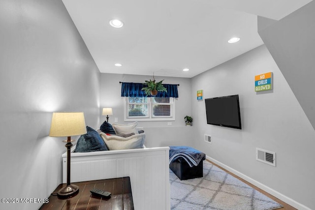27 Barkalow Ave, Freehold, NJ 07728 - living room with recessed lighting, baseboards, and wood finished floors