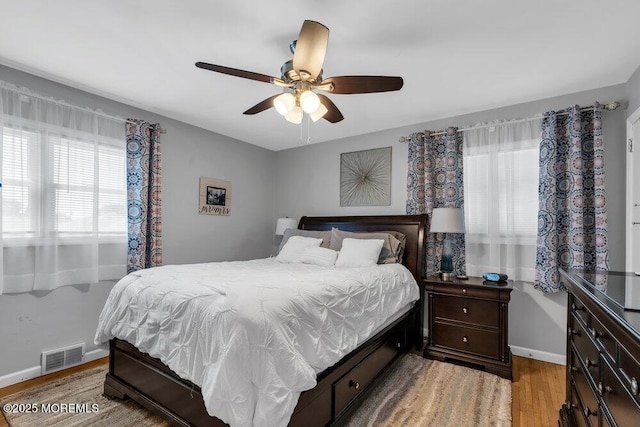 27 Barkalow Ave, Freehold, NJ 07728 - bedroom with light wood-type flooring, baseboards, and a ceiling fan