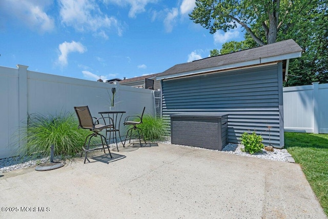 27 Barkalow Ave, Freehold, NJ 07728 - fenced backyard featuring a patio area and an outbuilding