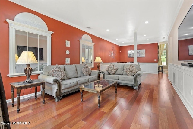 2420 Canterbury Ln, North Brunswick, NJ 08902 - living room featuring hardwood / wood-style flooring, a wainscoted wall, crown molding, and recessed lighting