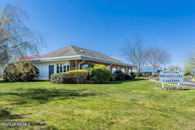 27 Maracaibo Pl, Toms River, NJ 08757 - view of side of home with a yard