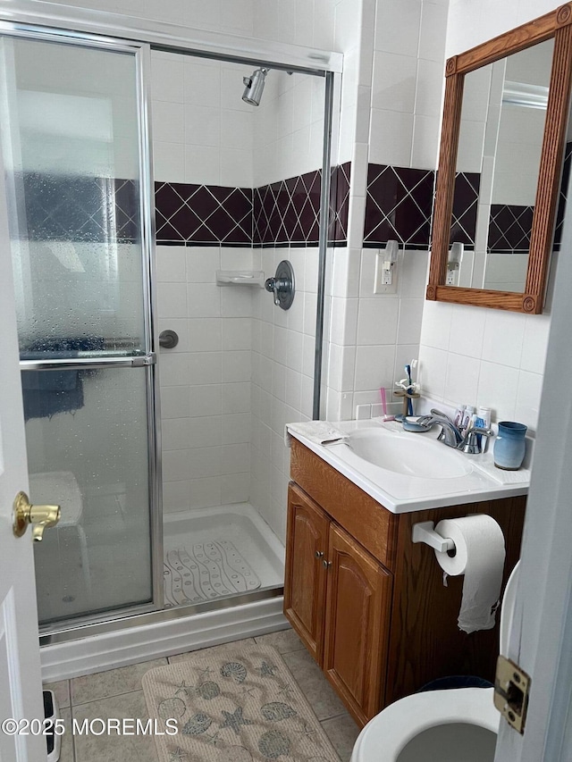 27 Maracaibo Pl, Toms River, NJ 08757 - full bathroom featuring a shower stall, vanity, decorative backsplash, and tile patterned flooring