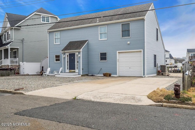 3 Drake Dr, Bayville, NJ 08721 - view of front of house featuring an attached garage, roof with shingles, and concrete driveway