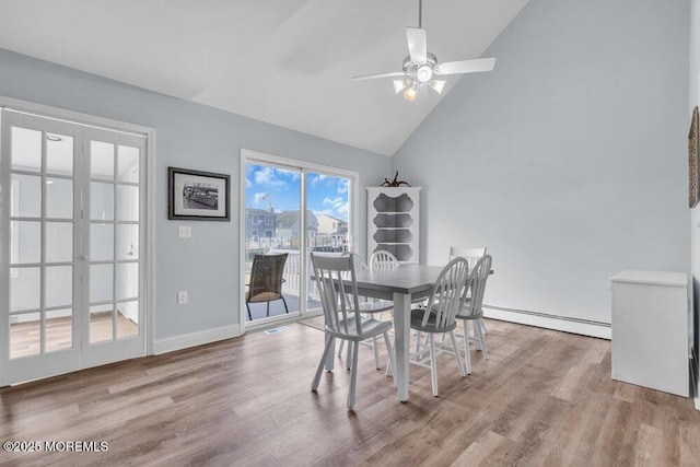 3 Drake Dr, Bayville, NJ 08721 - dining space featuring a baseboard heating unit, wood finished floors, high vaulted ceiling, ceiling fan, and baseboards