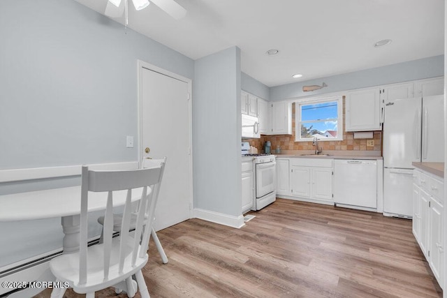 3 Drake Dr, Bayville, NJ 08721 - kitchen featuring white appliances, a sink, white cabinetry, light countertops, and light wood finished floors