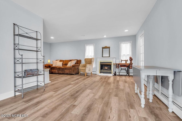 3 Drake Dr, Bayville, NJ 08721 - living area with wood finished floors, recessed lighting, a glass covered fireplace, and baseboards