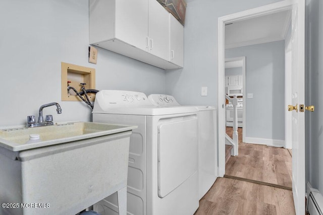 3 Drake Dr, Bayville, NJ 08721 - washroom with cabinet space, a baseboard heating unit, light wood finished floors, ornamental molding, and separate washer and dryer