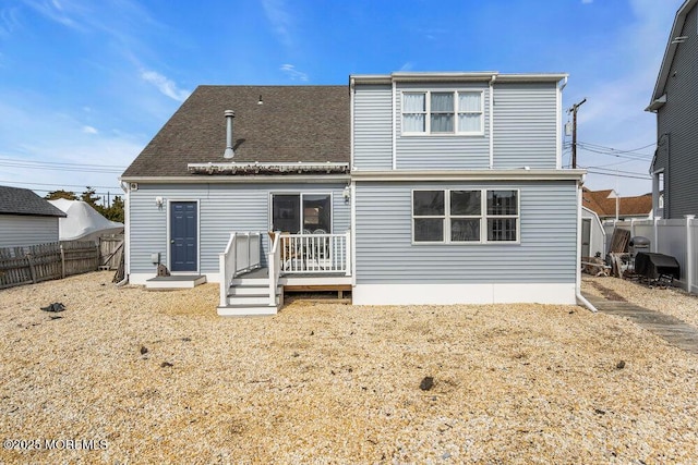 3 Drake Dr, Bayville, NJ 08721 - rear view of property featuring a wooden deck, a fenced backyard, and roof with shingles