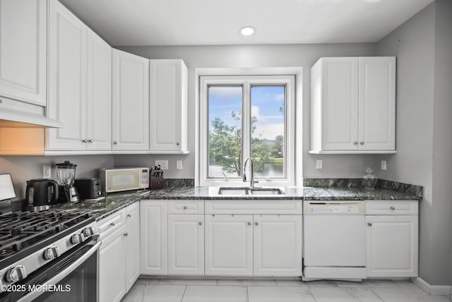 117 Sequoia Woods Ct, Holmdel, NJ 07733 - kitchen with white appliances, a sink, light marble finish flooring, white cabinetry, and recessed lighting