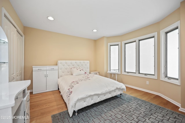 117 Sequoia Woods Ct, Holmdel, NJ 07733 - bedroom featuring light wood-type flooring, multiple windows, baseboards, and recessed lighting
