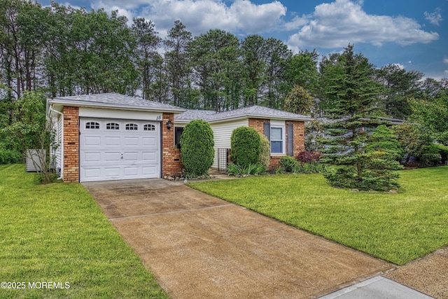 15 Courtshire Dr, Brick, NJ 08723 - view of front facade with brick siding, concrete driveway, an attached garage, and a front yard