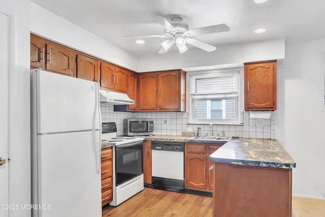 15 Courtshire Dr, Brick, NJ 08723 - kitchen featuring white appliances, a sink, under cabinet range hood, tasteful backsplash, and recessed lighting