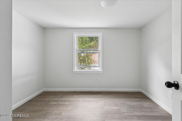 46 Roberts Rd, Toms River, NJ 08755 - empty room featuring wood finished floors and baseboards
