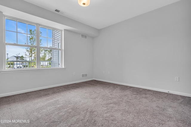 750 Lighthouse Dr Unit 1112, Barnegat, NJ 08005 - spare room featuring carpet flooring and baseboards