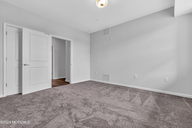750 Lighthouse Dr Unit 1112, Barnegat, NJ 08005 - unfurnished bedroom featuring dark carpet and baseboards
