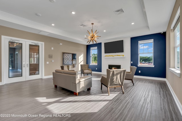 750 Lighthouse Dr Unit 1112, Barnegat, NJ 08005 - living area featuring a raised ceiling, wood finished floors, baseboards, a fireplace, and recessed lighting