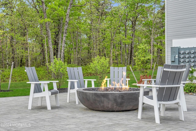 750 Lighthouse Dr Unit 1112, Barnegat, NJ 08005 - view of patio / terrace with a fire pit