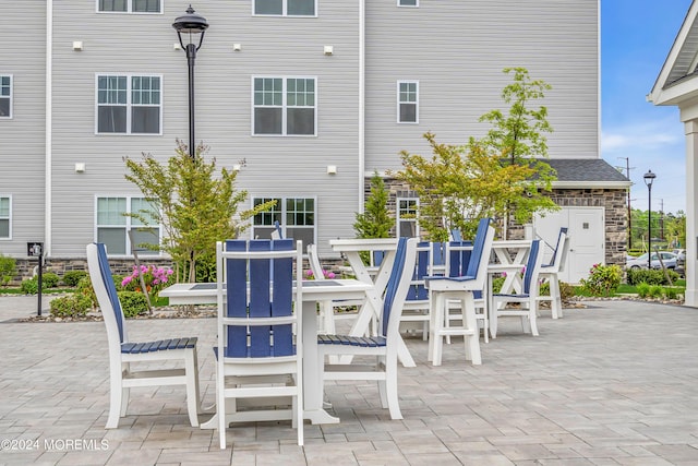 750 Lighthouse Dr Unit 1112, Barnegat, NJ 08005 - view of patio / terrace featuring outdoor dining space