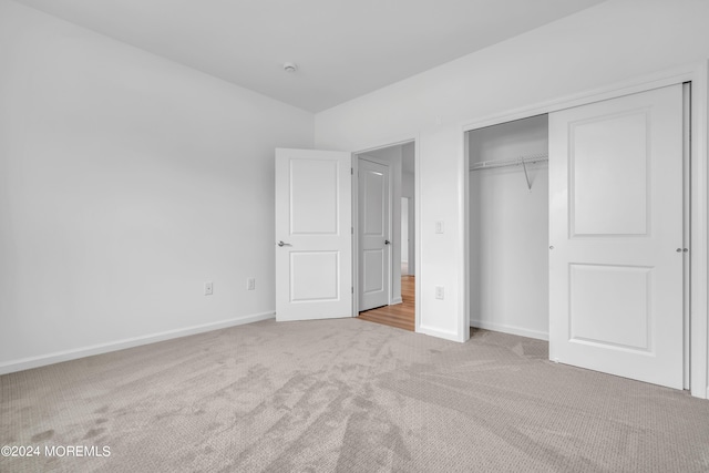750 Lighthouse Dr Unit 1103, Barnegat, NJ 08005 - unfurnished bedroom featuring carpet flooring, baseboards, and a closet