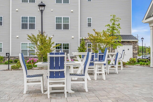 750 Lighthouse Dr Unit 1103, Barnegat, NJ 08005 - view of patio / terrace featuring outdoor dining space