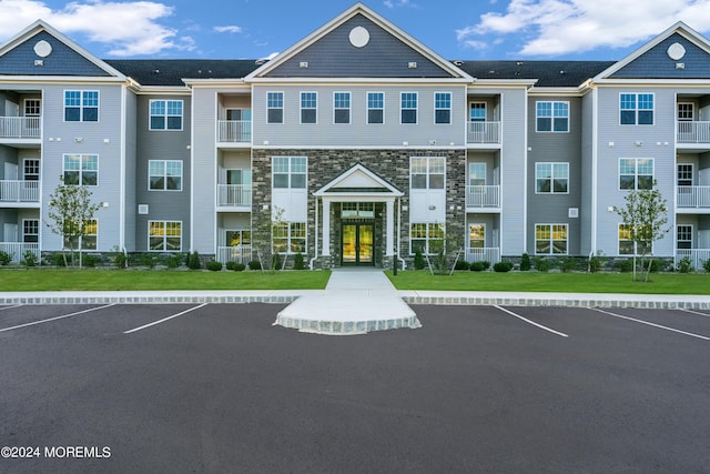 750 Lighthouse Dr Unit 3301, Barnegat, NJ 08005 - view of building exterior featuring uncovered parking