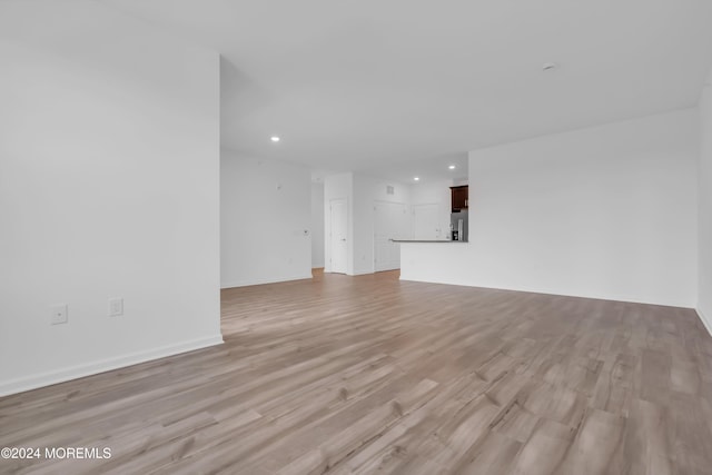 750 Lighthouse Dr Unit 3301, Barnegat, NJ 08005 - unfurnished living room with recessed lighting, light wood-style flooring, and baseboards