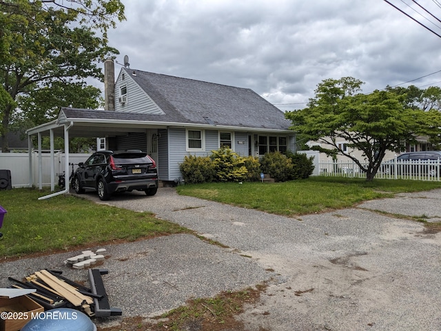 6 Hoover Dr, Brick, NJ 08724 - view of front of home featuring driveway, roof with shingles, an attached carport, and a chimney