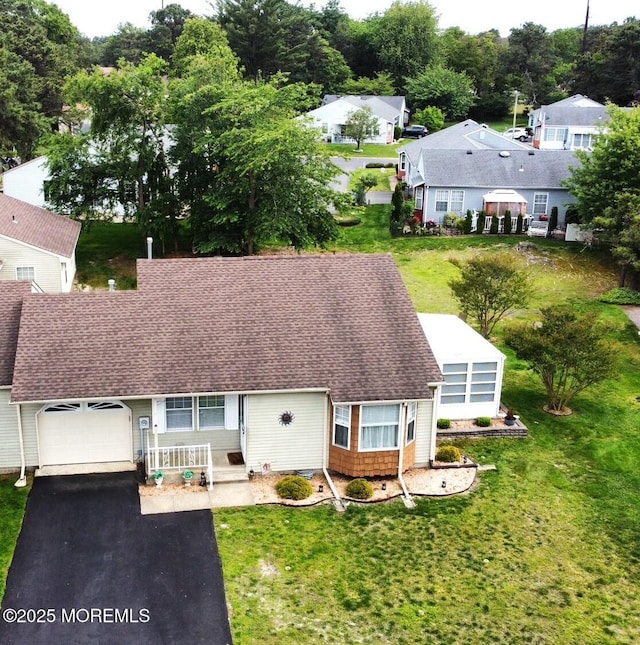 14 Ardsley Ave Unit 64, Whiting, NJ 08759 - view of front of house with a garage, driveway, a shingled roof, and a front yard