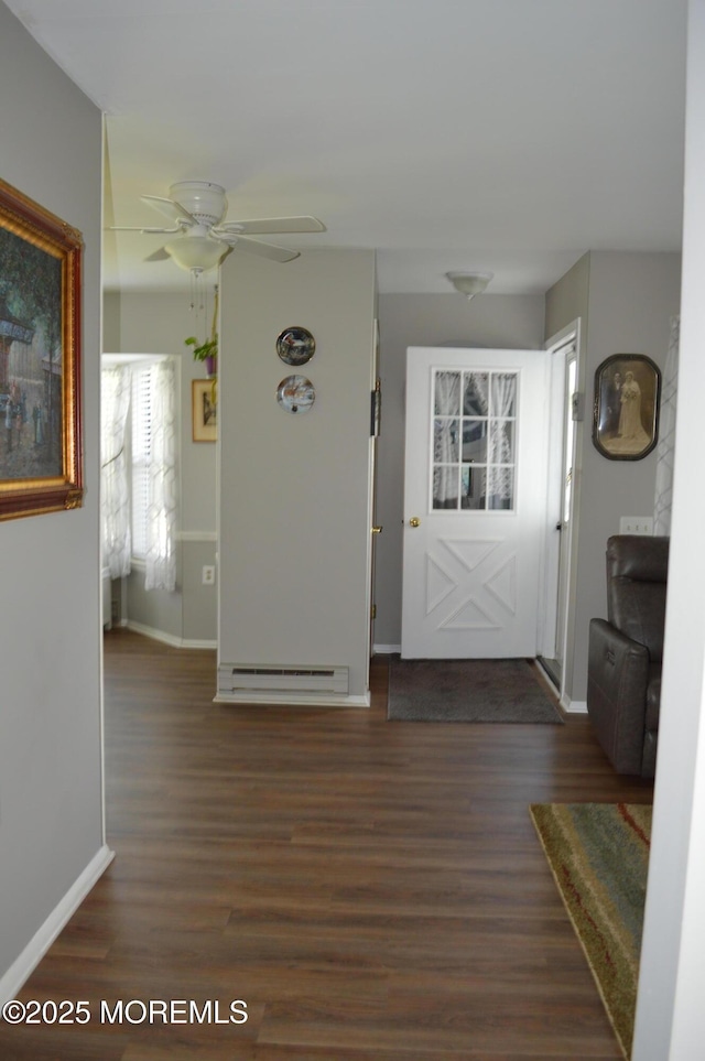 14 Ardsley Ave Unit 64, Whiting, NJ 08759 - entryway with baseboard heating, dark wood-style floors, baseboards, and ceiling fan