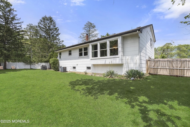 90 Old Bridge Dr, Howell, NJ 07731 - rear view of property featuring a chimney and cooling unit