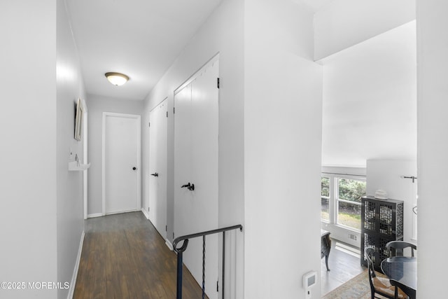 90 Old Bridge Dr, Howell, NJ 07731 - hall with dark wood-type flooring, an upstairs landing, and baseboards