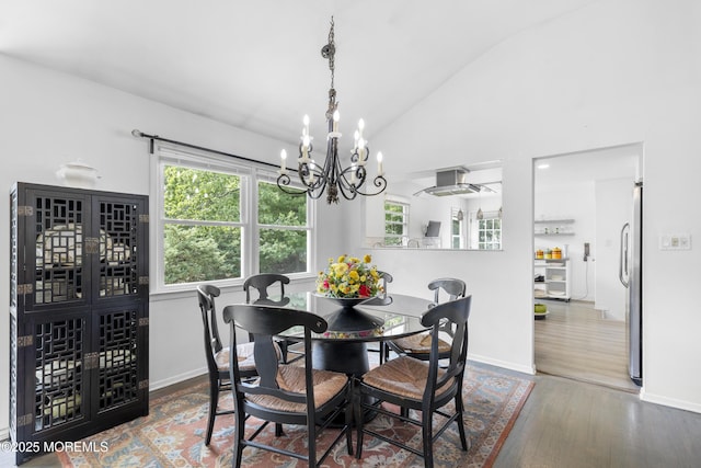 90 Old Bridge Dr, Howell, NJ 07731 - dining space with lofted ceiling, a chandelier, wood finished floors, and baseboards
