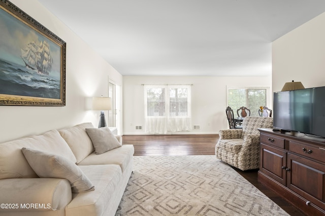 8 Carter Way, Brick, NJ 08723 - living room featuring dark wood-style floors and baseboards