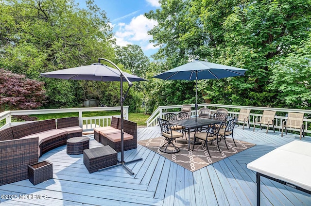 369 Indiana Ave, Long Branch, NJ 07740 - wooden terrace with outdoor dining space, an outdoor hangout area, and view of wooded area