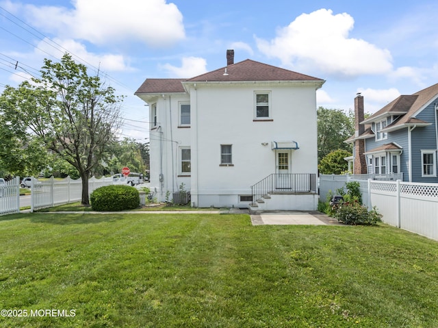42 Chestnut St, Red Bank, NJ 07701 - rear view of property with cooling unit, stucco siding, a chimney, and roof with shingles