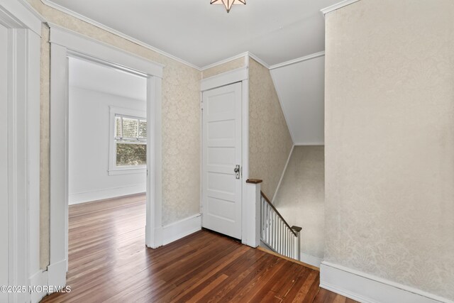 42 Chestnut St, Red Bank, NJ 07701 - staircase with wood finished floors, wallpapered walls, ornamental molding, and baseboards
