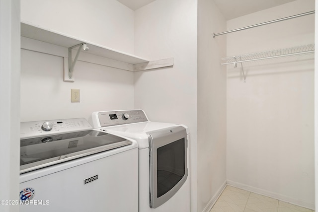 29 Copley Ct Unit 6, Freehold, NJ 07728 - washroom with washing machine and dryer and baseboards