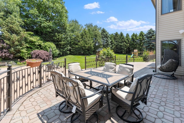 806 Turquoise Trl, Morganville, NJ 07751 - view of patio featuring outdoor dining space and a playground