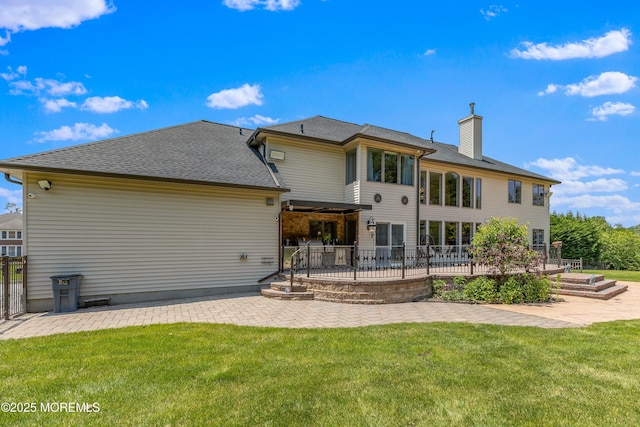 806 Turquoise Trl, Morganville, NJ 07751 - rear view of property with a patio, a chimney, and a shingled roof