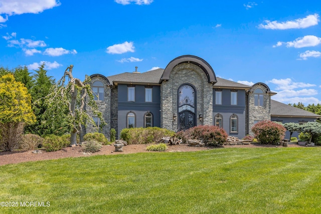 806 Turquoise Trl, Morganville, NJ 07751 - view of front facade with a front yard and stone siding