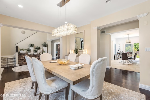 806 Turquoise Trl, Morganville, NJ 07751 - dining space featuring a chandelier, stairway, dark wood finished floors, and recessed lighting
