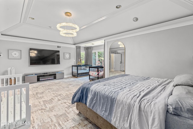 806 Turquoise Trl, Morganville, NJ 07751 - bedroom featuring a tray ceiling, crown molding, a chandelier, recessed lighting, and arched walkways