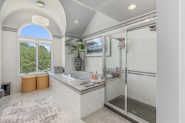 806 Turquoise Trl, Morganville, NJ 07751 - full bath with a bath, plenty of natural light, vaulted ceiling, tile patterned floors, and a shower stall
