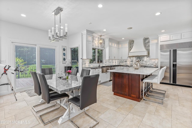 806 Turquoise Trl, Morganville, NJ 07751 - dining room featuring healthy amount of natural light, a chandelier, and recessed lighting
