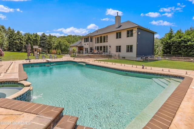 806 Turquoise Trl, Morganville, NJ 07751 - view of swimming pool featuring a playground, a pool with connected hot tub, and a patio
