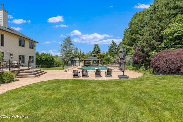 806 Turquoise Trl, Morganville, NJ 07751 - view of green lawn with a gazebo, a patio area, and an outdoor pool